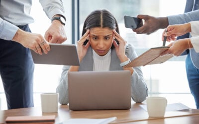 Overwhelmed employee juggling work and family responsibilities while missing a court date